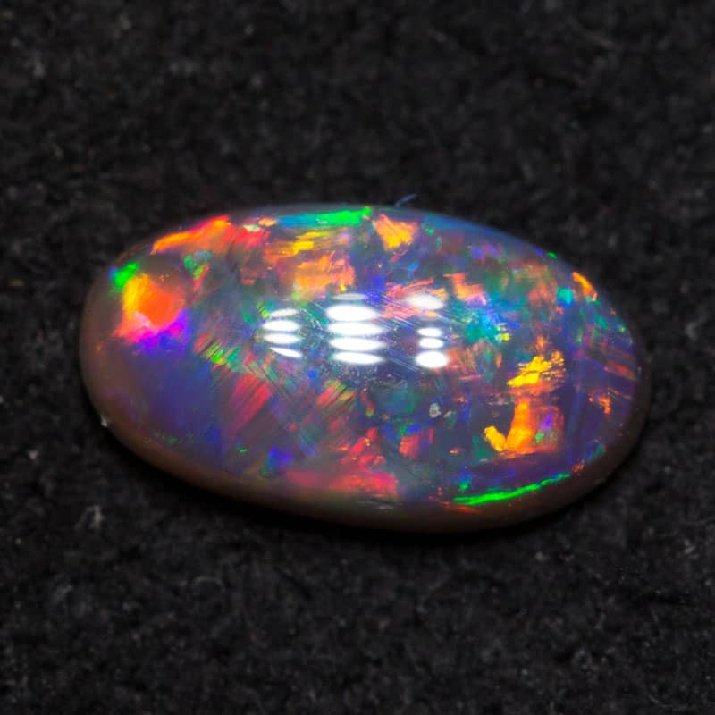 0.41 ct gem black opal 6.7x3.7x2.5mm