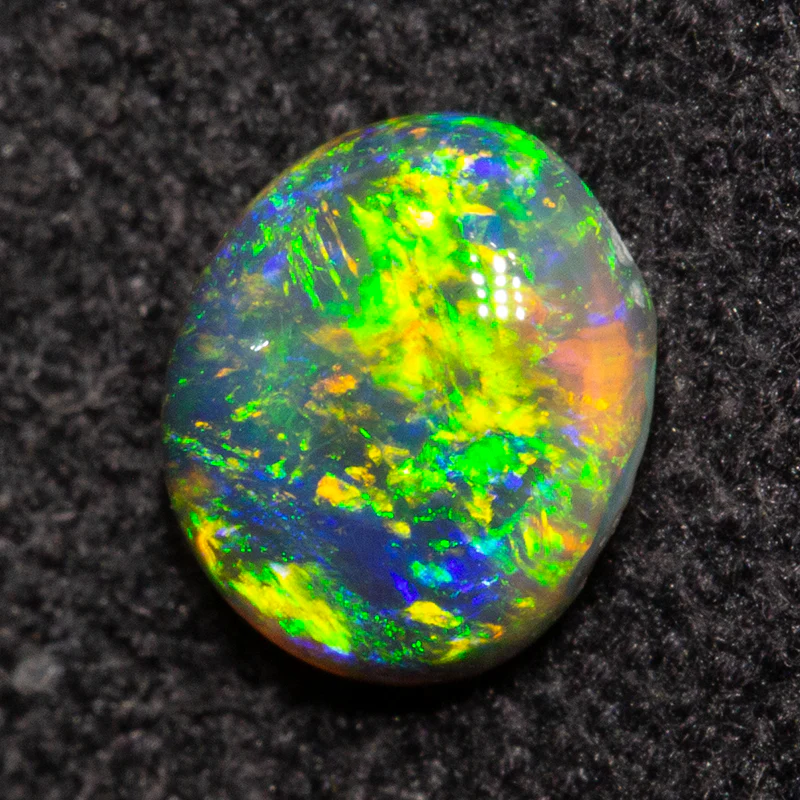 0.42 ct black opal 5.4x4.7x2.4mm