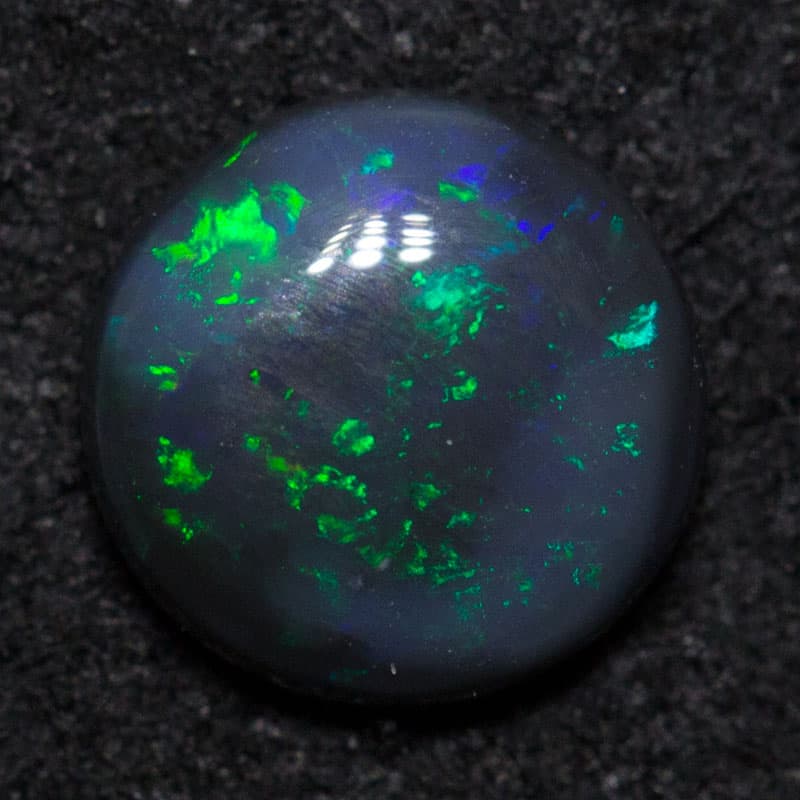 0.42 ct black opal 5.6x5.6x2mm