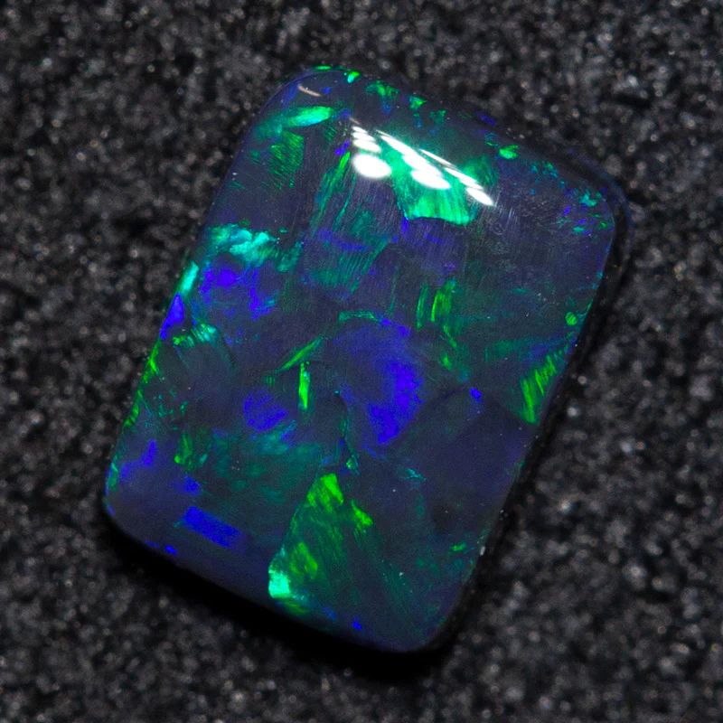 0.42 ct black opal 5.8x4.3x2mm