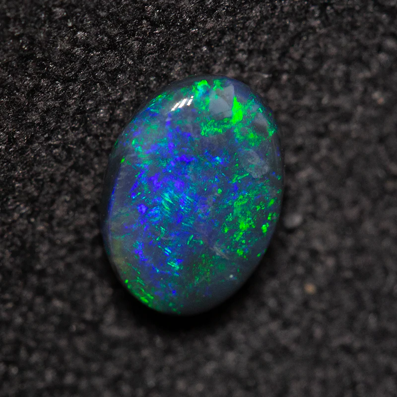 0.42 ct black opal 6.1x4.5x2.2mm