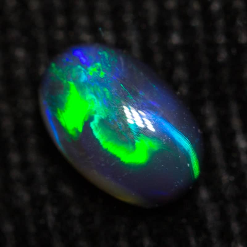 0.42 ct black opal 6.2x4.1x2.7mm