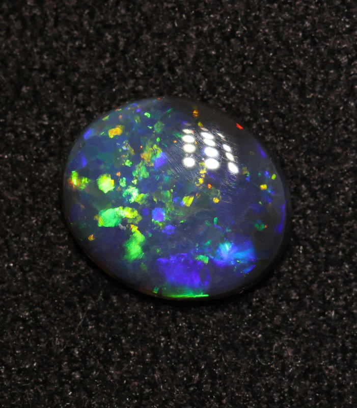 0.42 ct black opal 6.6x5.6x1.8mm