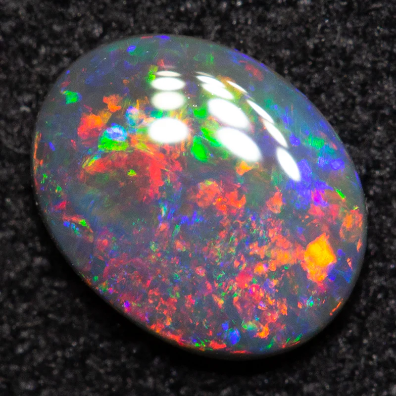 0.42 ct black opal 6.7x5.3x1.7mm