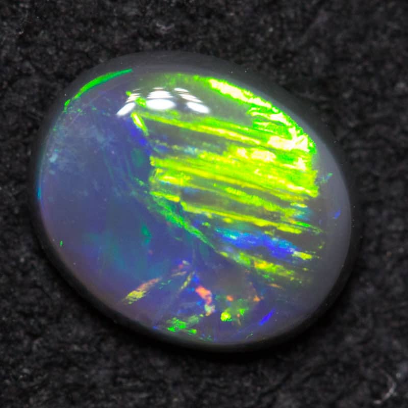 0.42 ct black opal 6x5x2mm