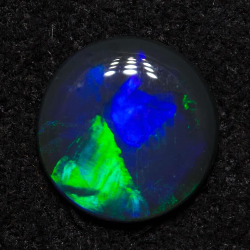 0.42 ct black opal 6x6x1.8mm