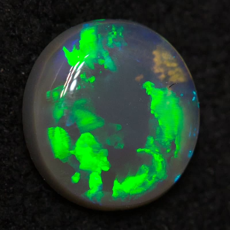 0.42 ct dark opal 5.7x5.4x2mm