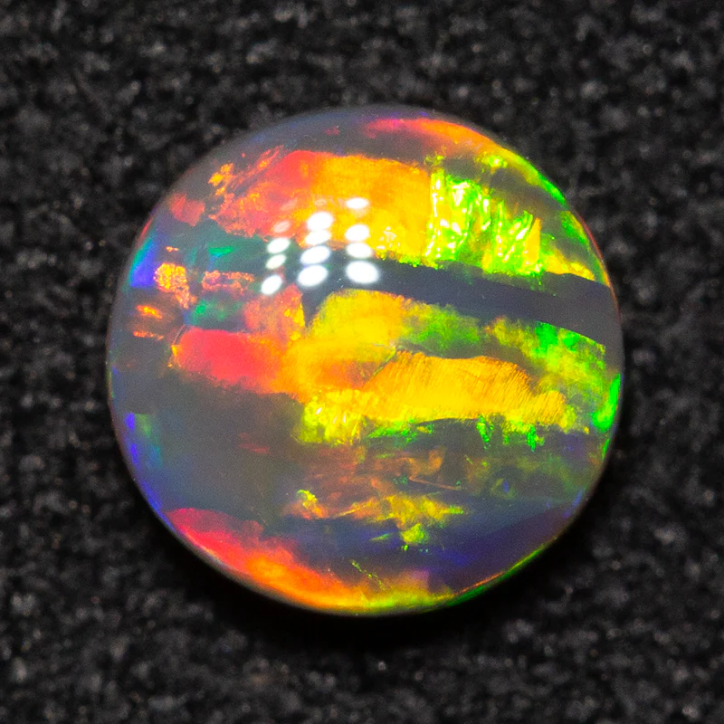 0.43 ct black opal 5.3x5.2x2.3mm