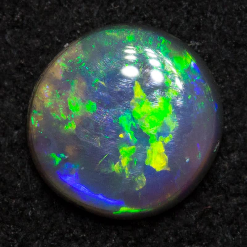 0.43 ct black opal 5.4x5.4x2.1mm