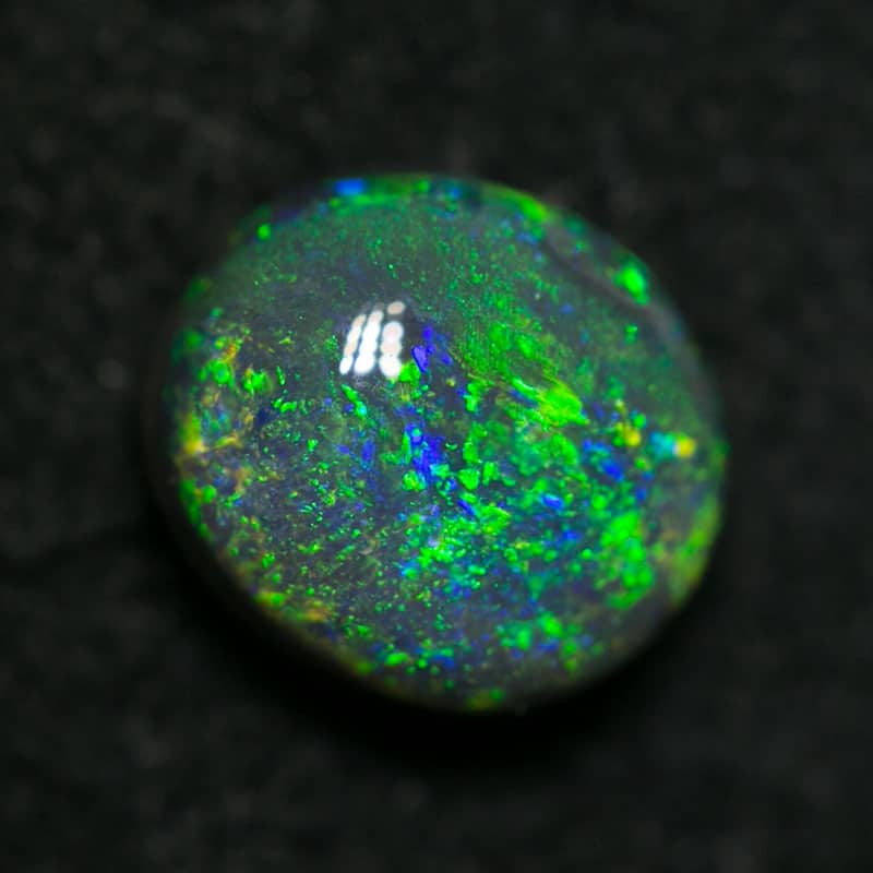 0.43 ct black opal 5x4.5x2mm