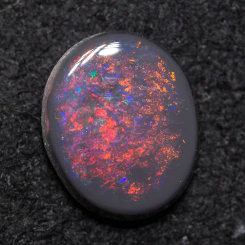 0.43 ct black opal 6.3x5.2x1.9mm