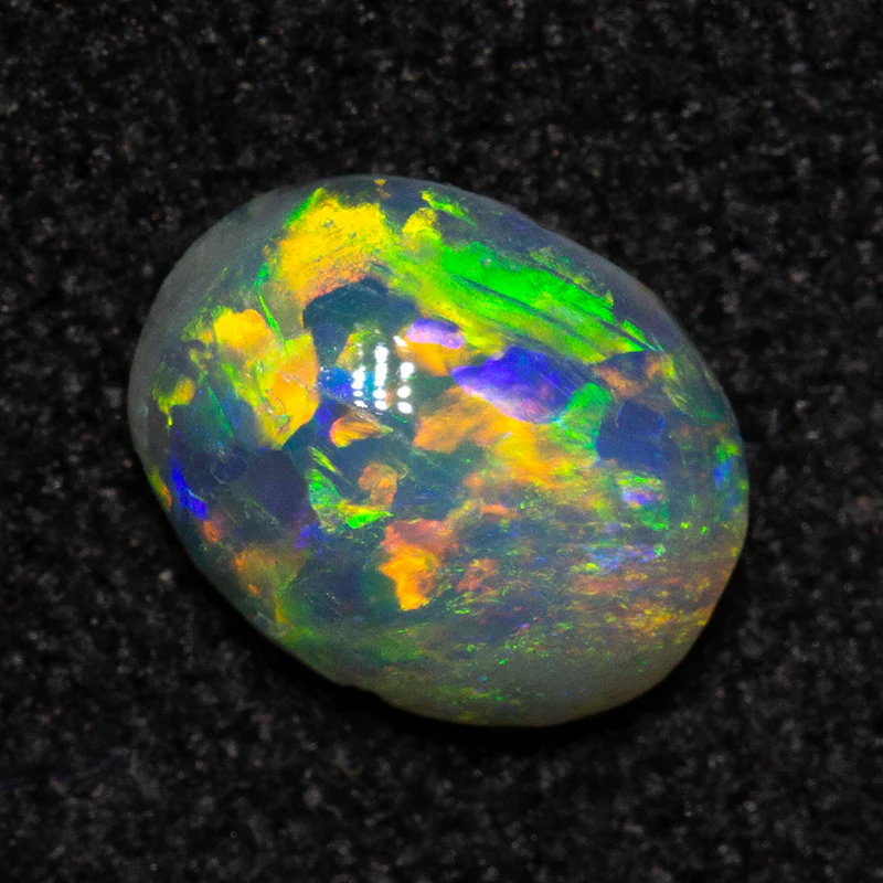 0.43 ct dark opal 6.1x4.8x2.5mm