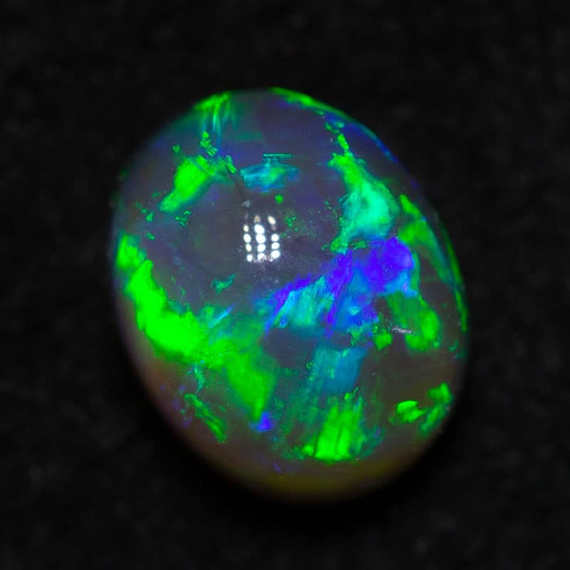 0.44 ct dark opal 5x4x3.2mm
