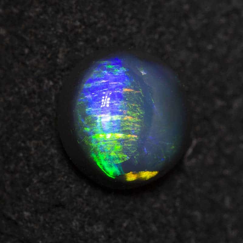 0.45 ct black opal 5.4x5.3x2.6mm