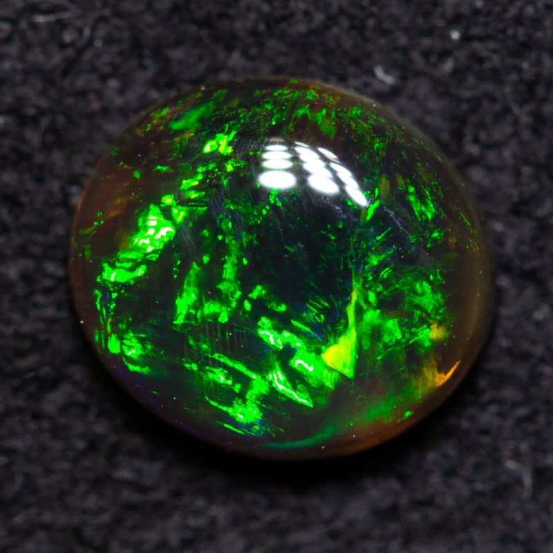 0.45 ct black opal 5.8x5.2x2.5mm