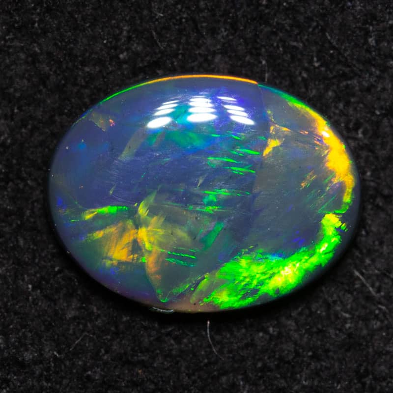 0.45 ct black opal 7.2x5.5x1.8mm