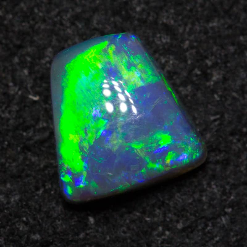 0.46 ct black opal 5.1x4.2x2.7mm