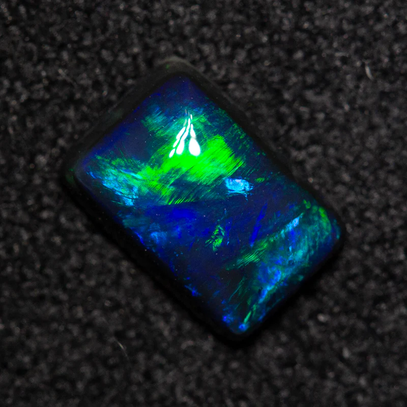 0.46 ct black opal 6.5x4.4x2.1mm