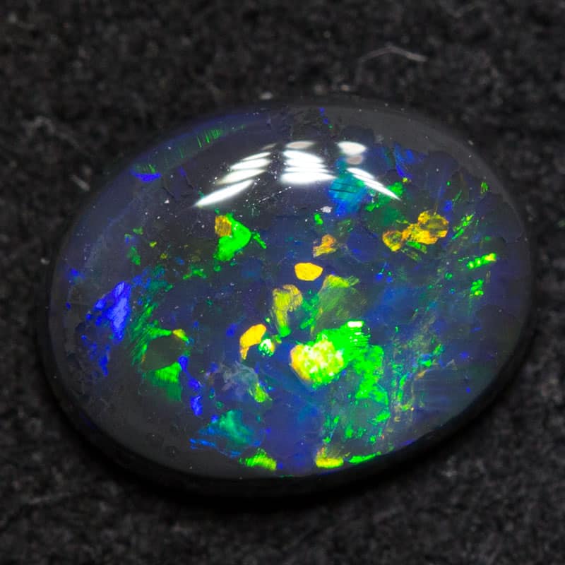 0.46 ct black opal 6.5x5.1x2mm