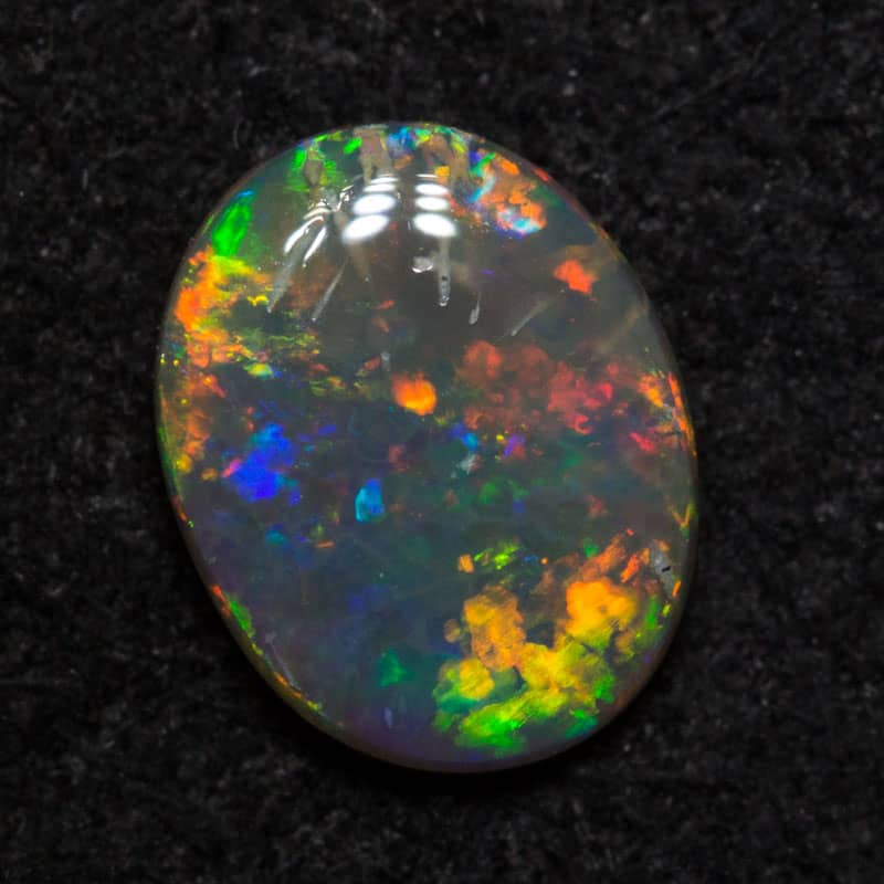0.46 ct black opal 6.6x5.2x1.8mm