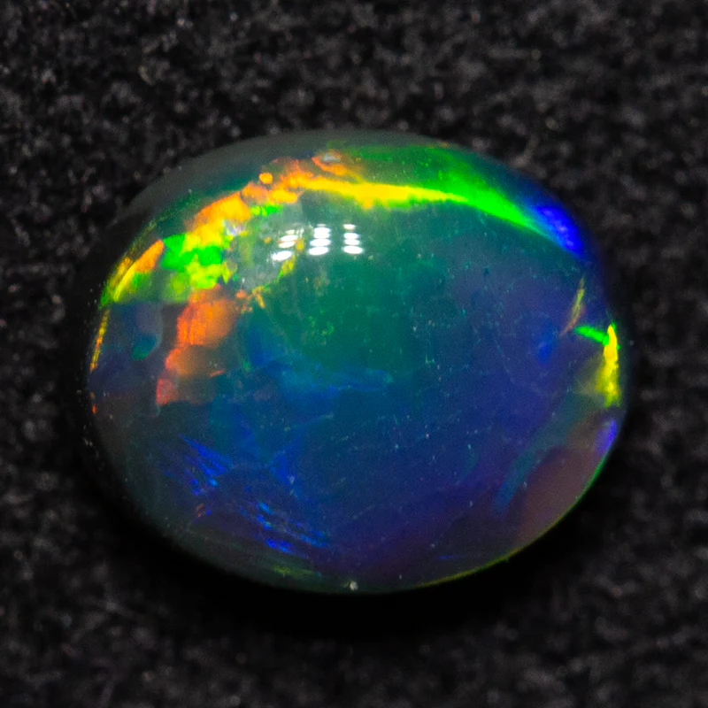 0.47 ct black opal 5.8x4.6x2.7mm