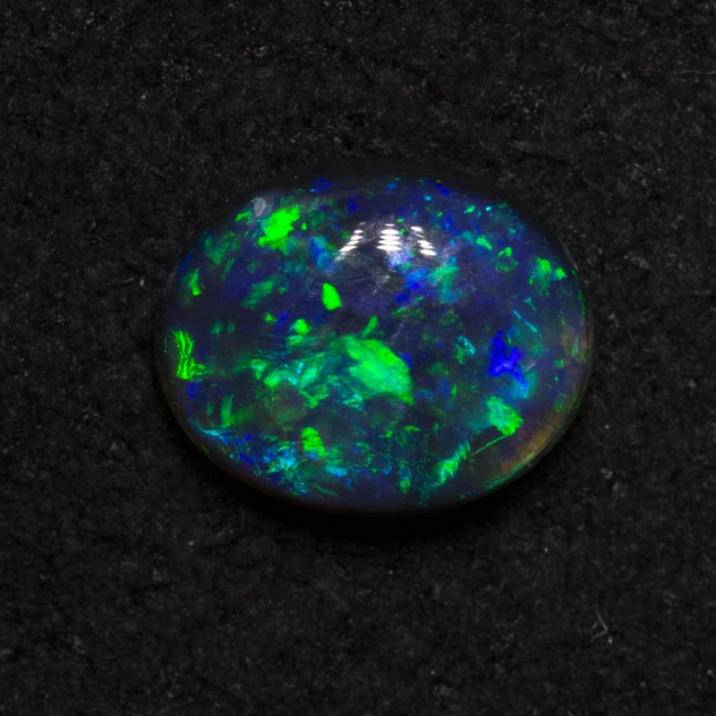 0.47 ct black opal 5.9x4.8x2.5mm