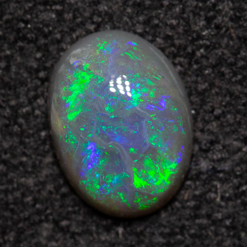 0.47 ct black opal 6.5x4.8x2.4mm