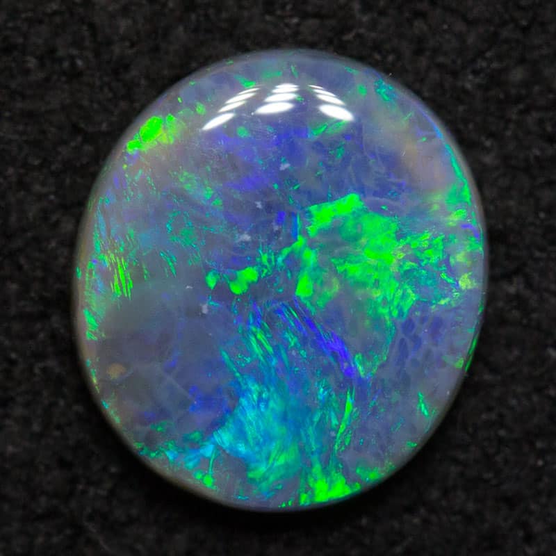 0.47 ct dark opal 6.3x5.7x1.8mm