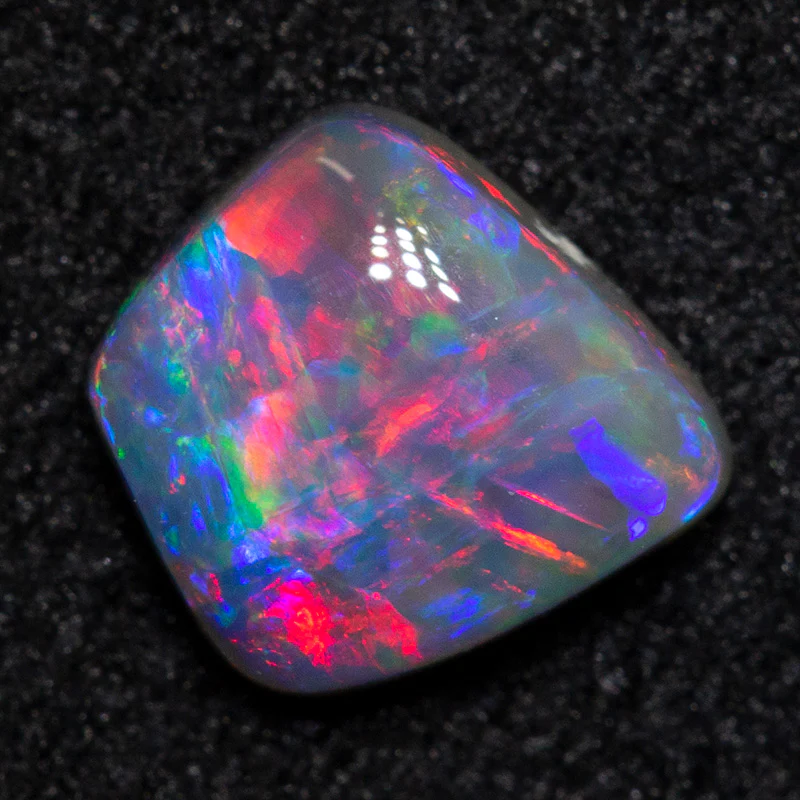 0.48 ct black opal 5.4x5.5x2.2mm