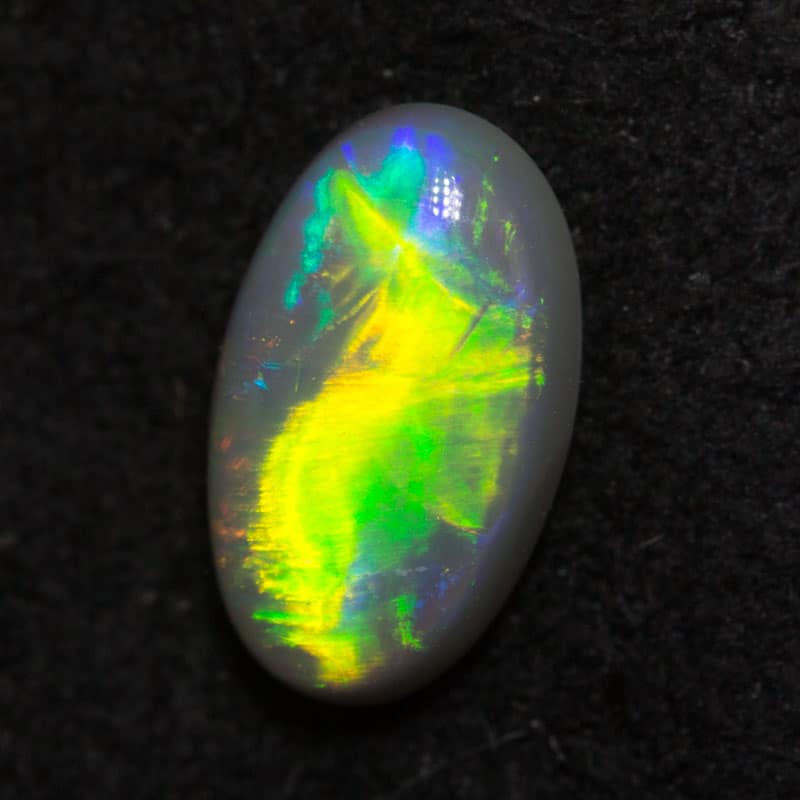 0.48 ct dark opal 7.1x4.1x2.5mm