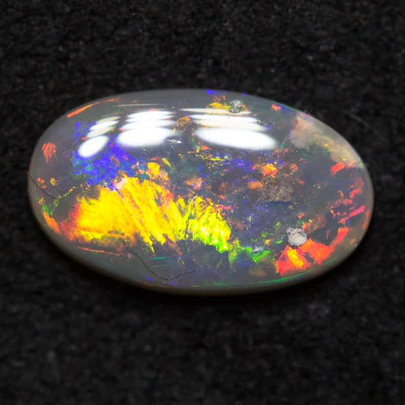 0.48 ct dark opal 8x5x2mm