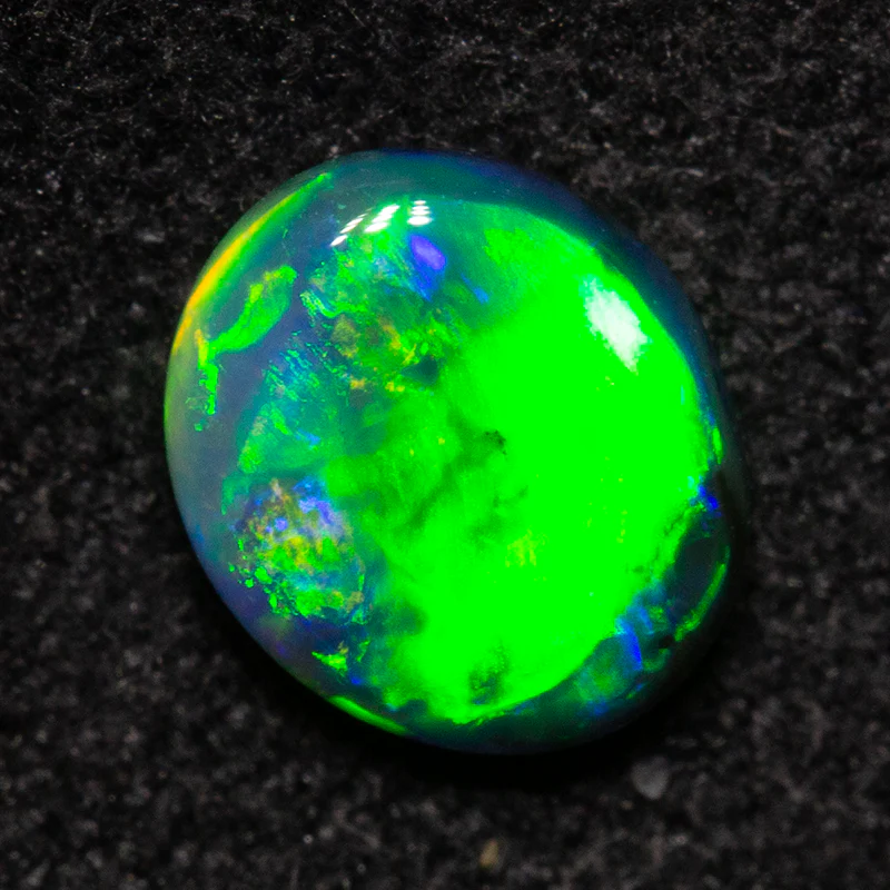 0.48 ct double-sided black opal 5.9x5.1x2.3mm