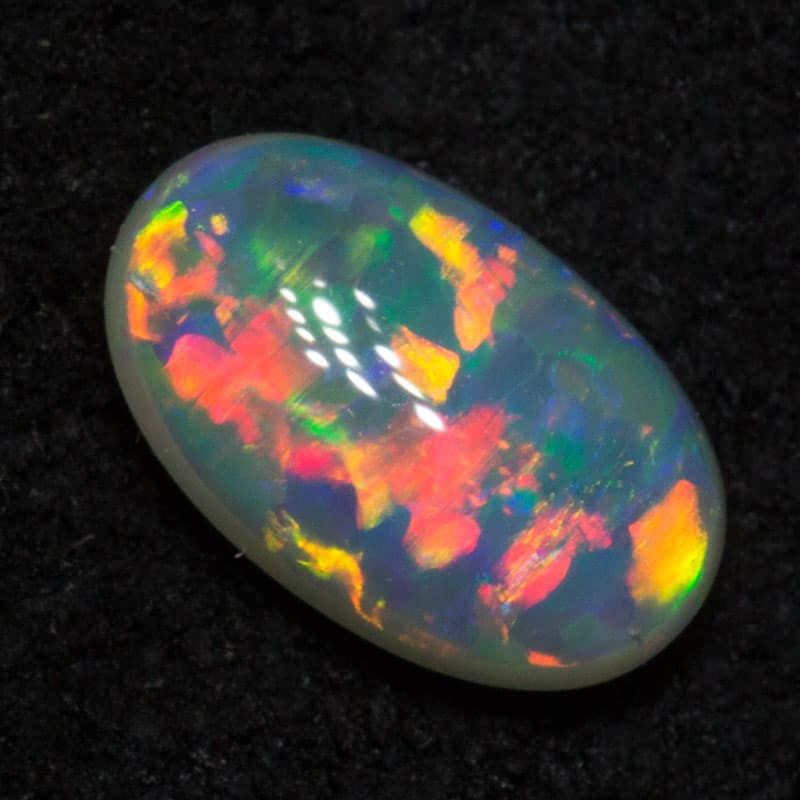 0.48 ct double sided crystal opal 6.6x4.1x2.7mm