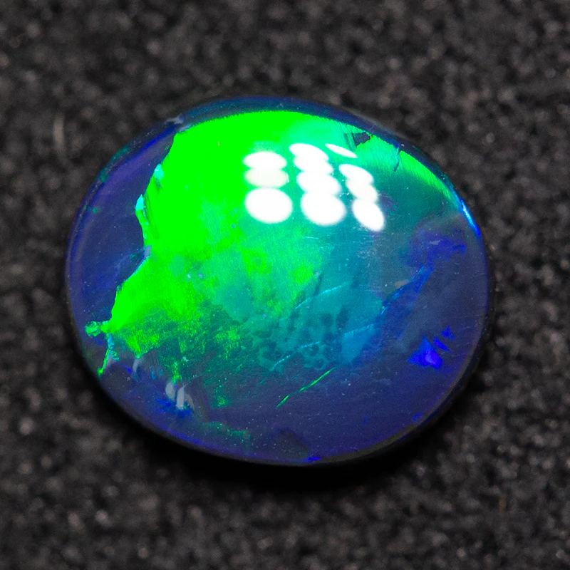 0.49ct black opal 6.3x5.5x2mm