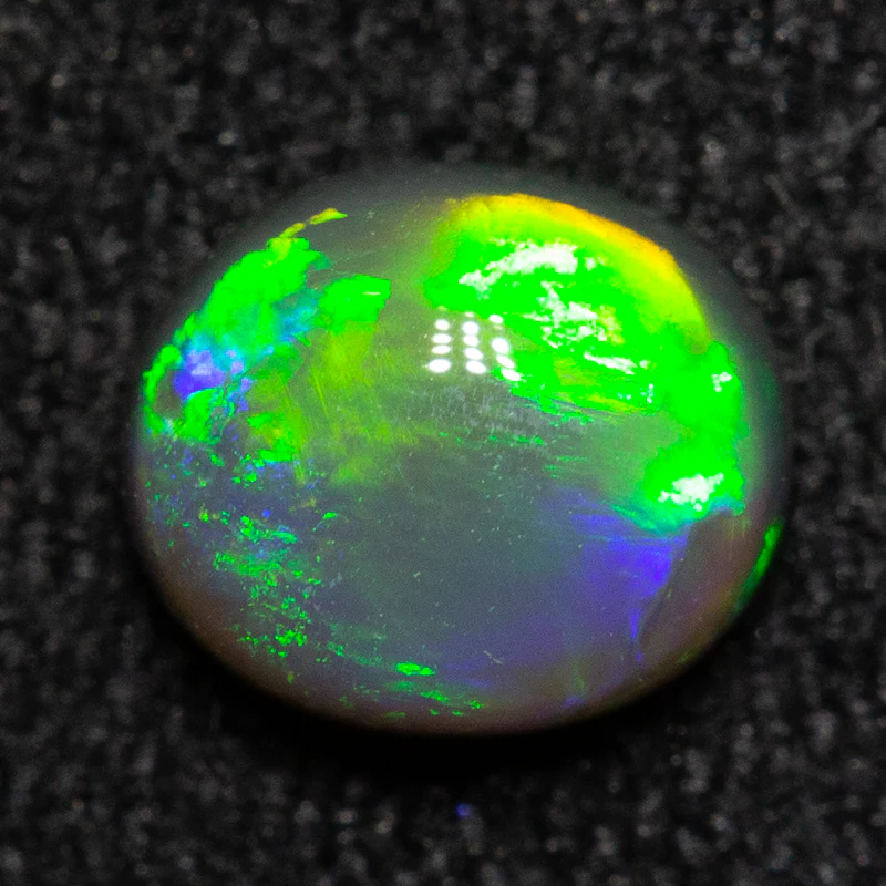 0.50 ct black opal 5.5x4.7x3mm