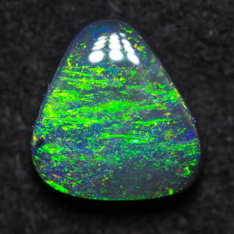 0.50 ct black opal 5.9x5.5x2.3mm