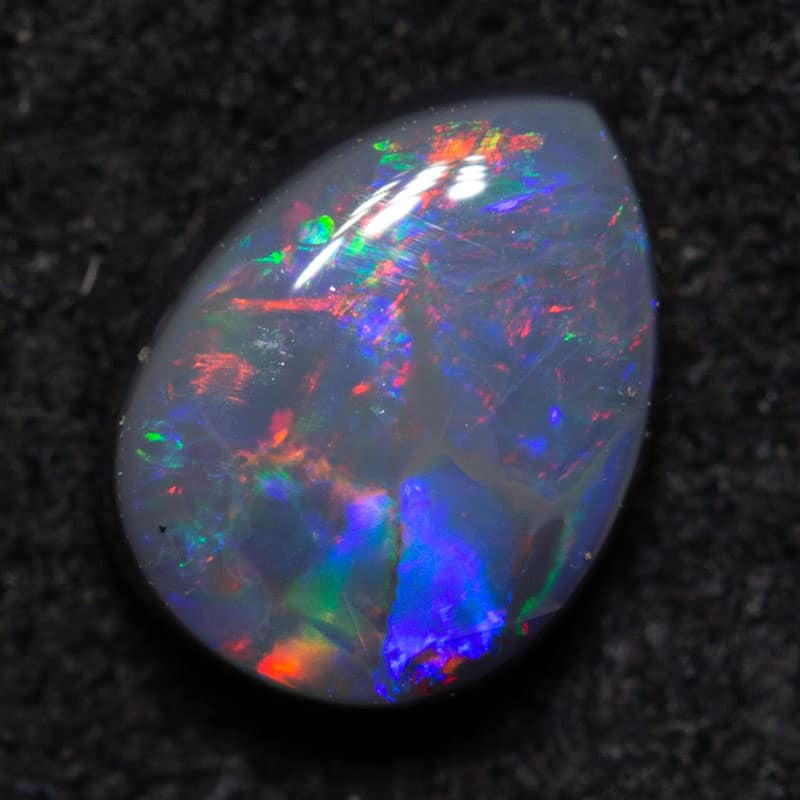 0.50 ct black opal 6.1x4.5x2.7mm