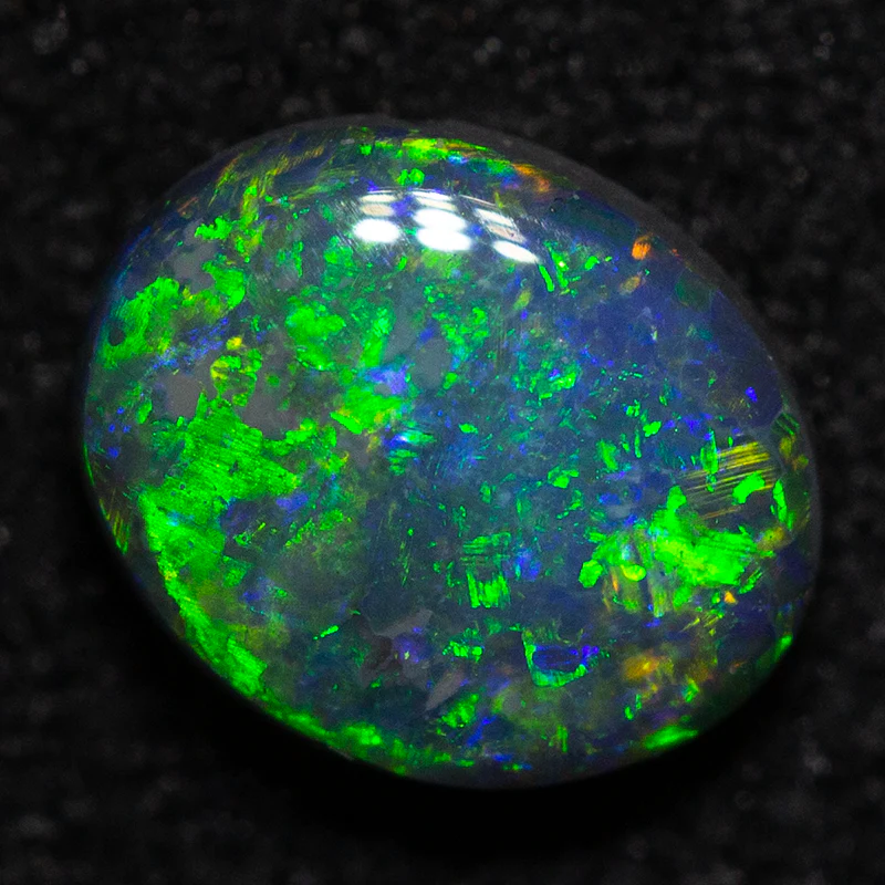 0.50 ct black opal 6.2x5.1x2.6mm