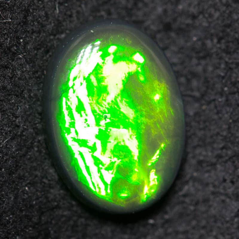 0.50 ct black opal 7x5x2.1mm