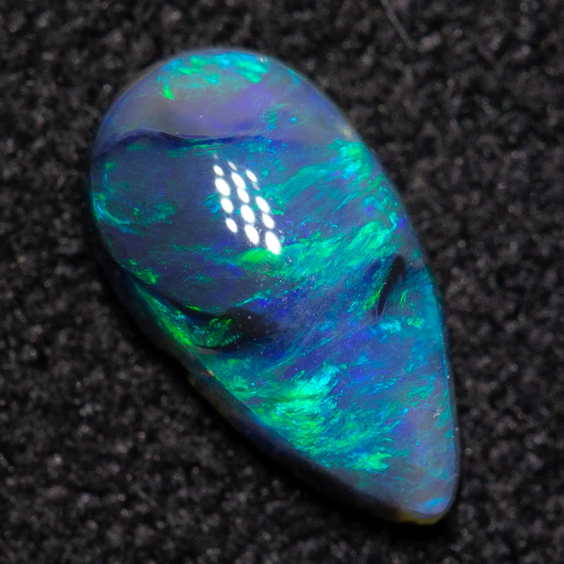 0.50 ct dark opal 7.8x4.2x2.7mm