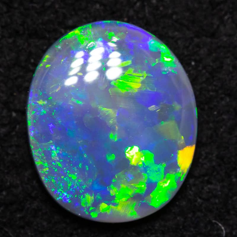 0.50ct black opal 7x6x2mm