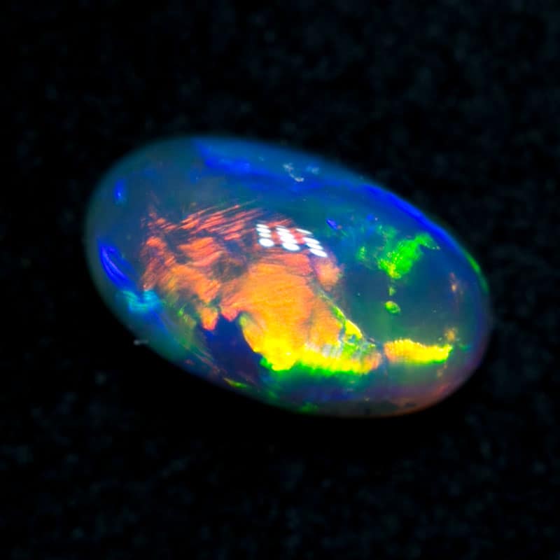0.51 ct black crystal opal gem 6x3.5x3mm