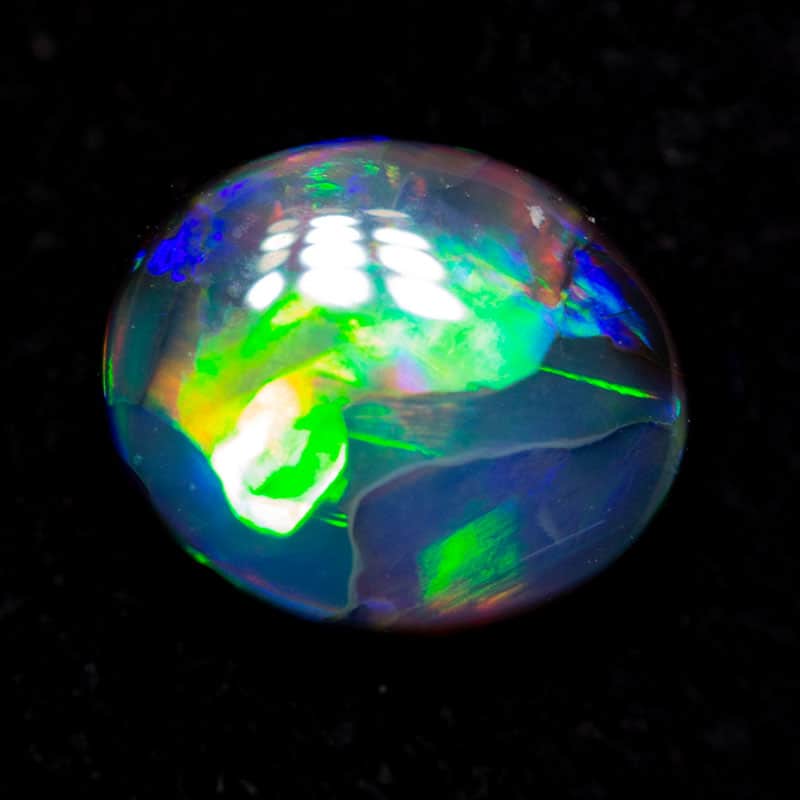 0.51 ct black opal 6.1x5.2x2.3mm