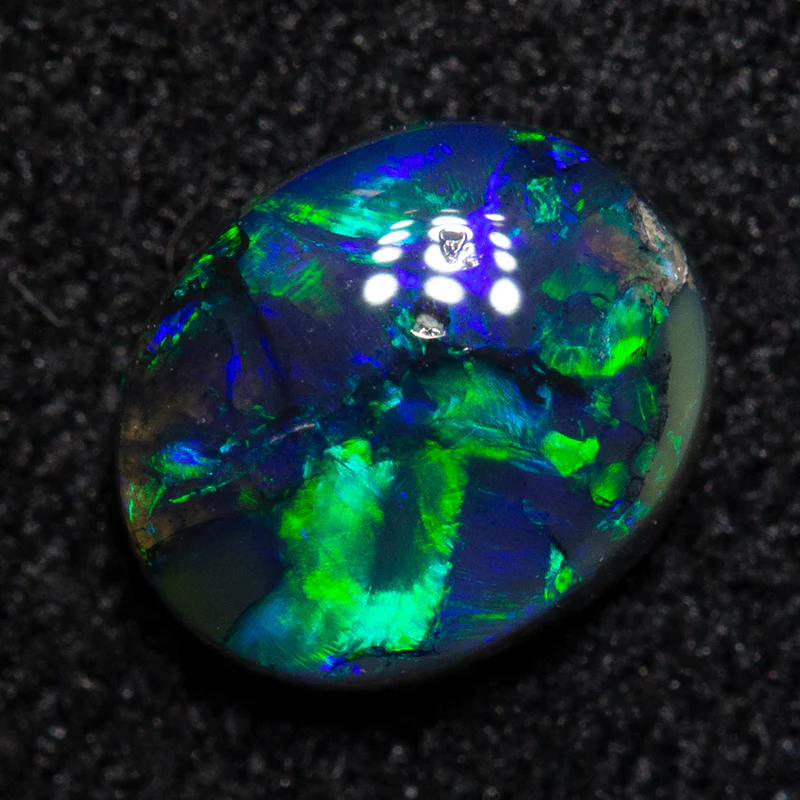 0.51 ct black opal 6.1x5x2.4mm