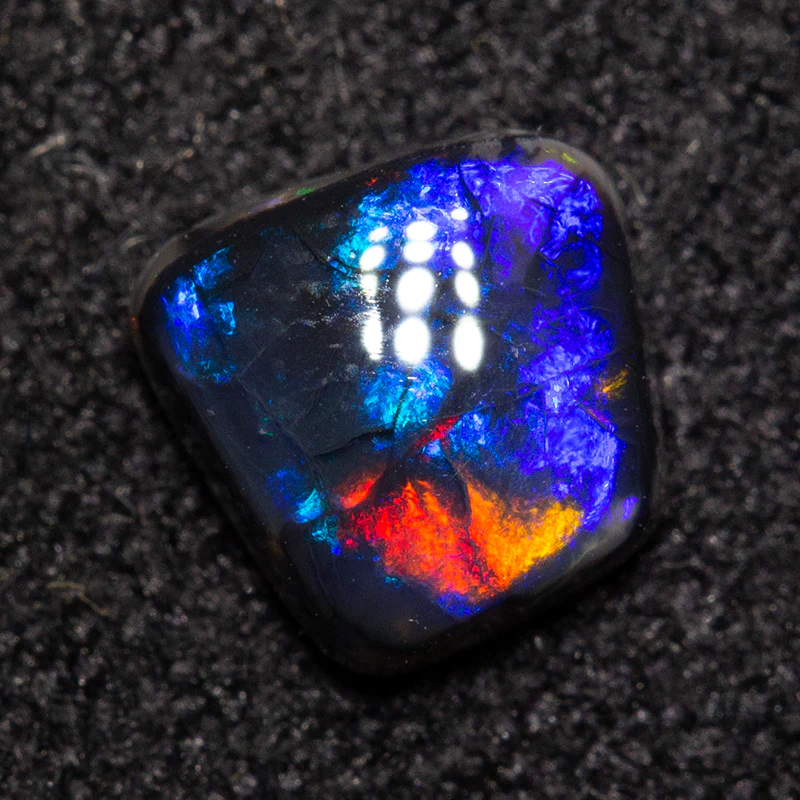 0.51 ct black opal 6.1x6.1x2.4mm