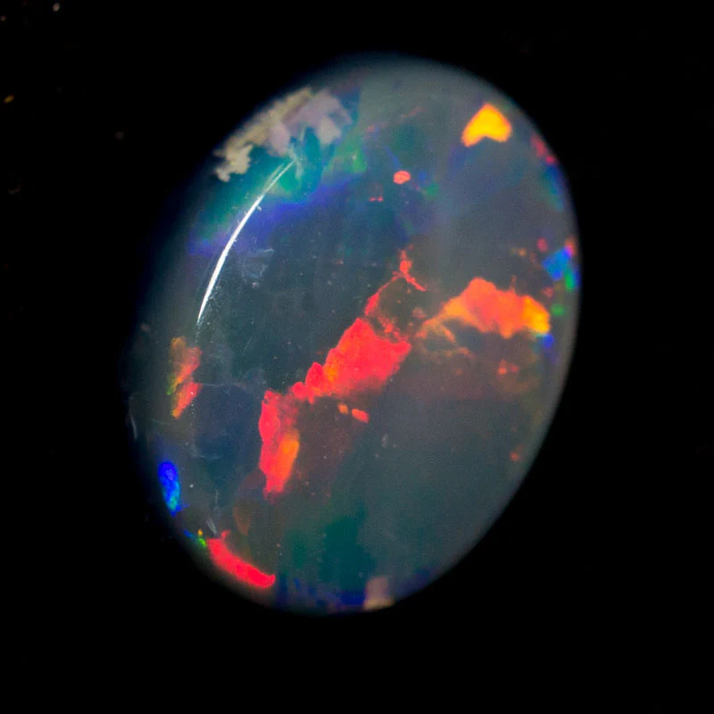 0.51 ct black opal 6.3x4.8x2.6mm