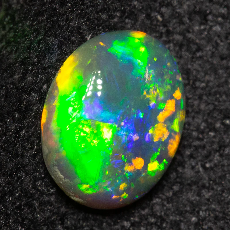 0.51 ct black opal 6.6x5.3x2.5mm