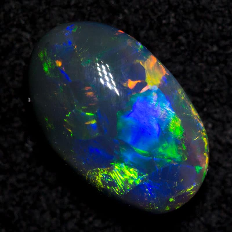 0.51 ct black opal 6.7x4.3x2.6mm