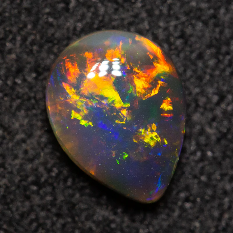 0.52 ct black opal 6.6x5x2.4mm
