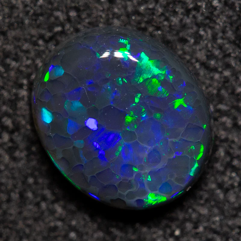 0.52 ct black opal 6x5.1x2.4mm